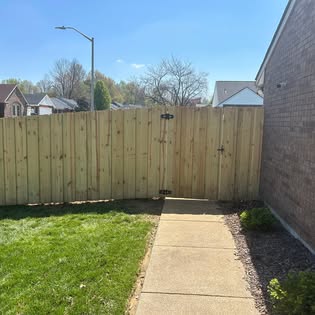 Fence + gate along the walkway